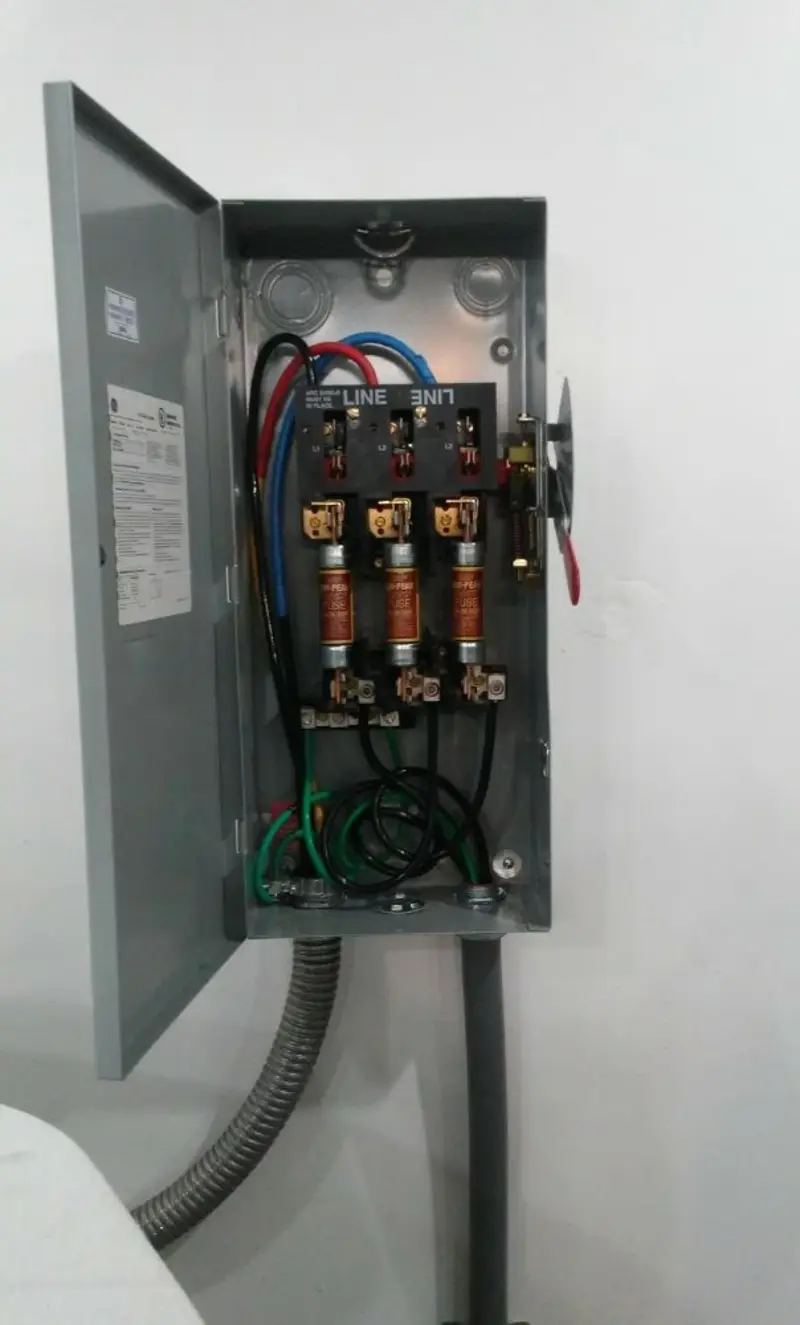 Three-phase disconnect switch installed for Smoke Detector Installation in Wind Lake
